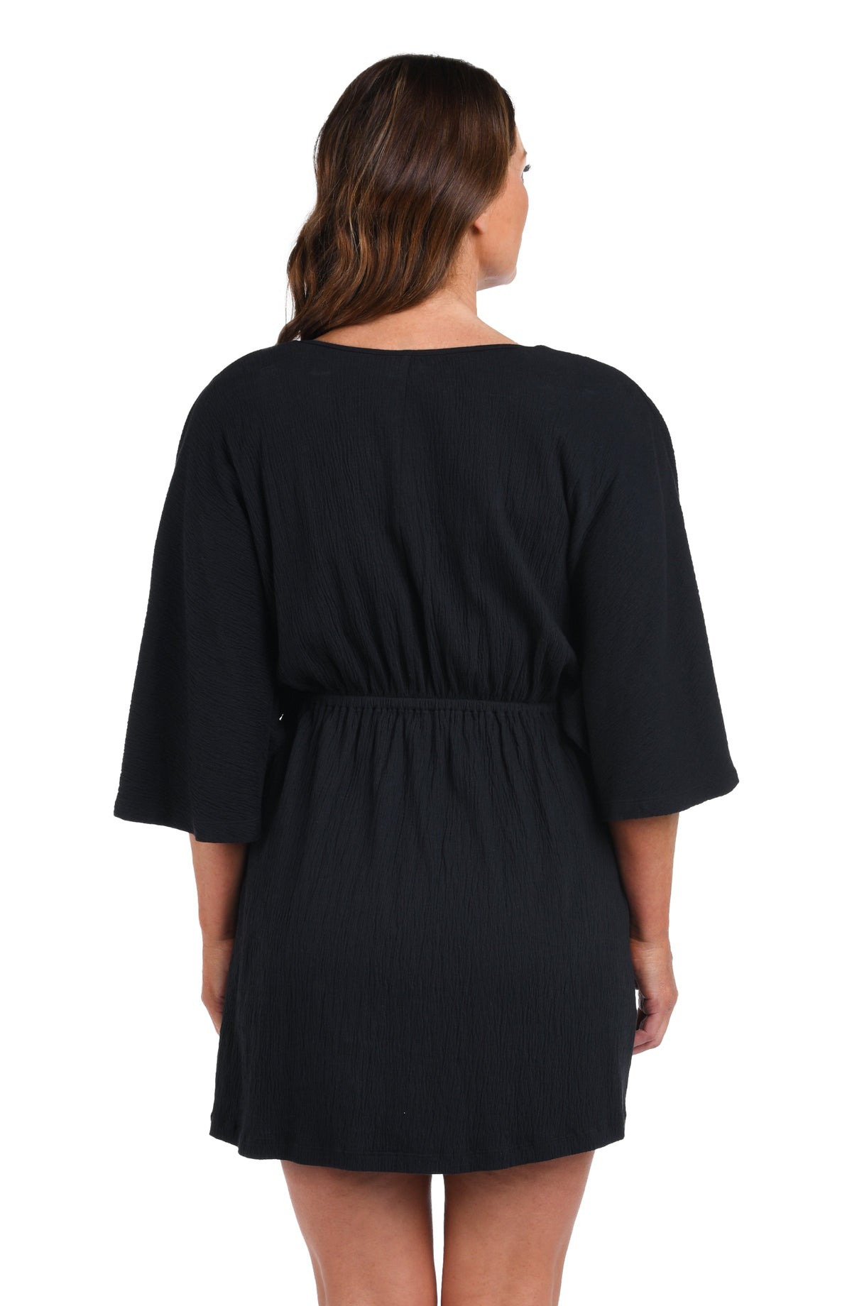Model is wearing a black Solid Kimono Tunic Cover Up.