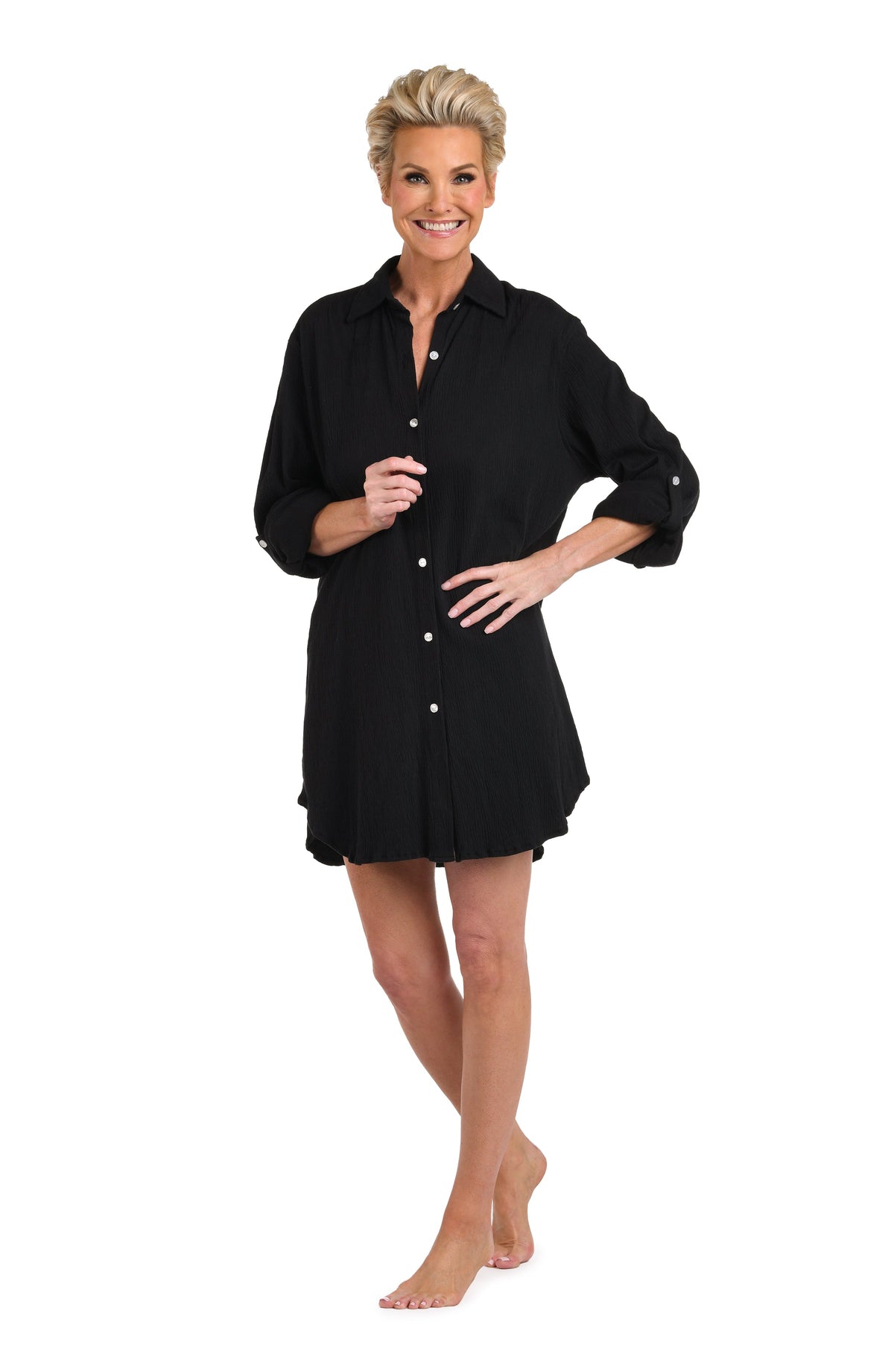 Model is wearing a solid black Button Down Resort Shirt Cover Up.