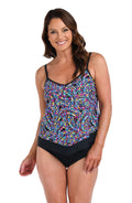 Front image of model wearing a Colorburst Flutter Hem Tankini Top.