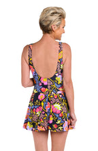 Back image of model wearing an Ornamental Garden Surplice Swim Dress One Piece.