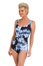 Front image of model wearing a Moonlight Tropics Spa Shirred Front Girl Leg One Piece.