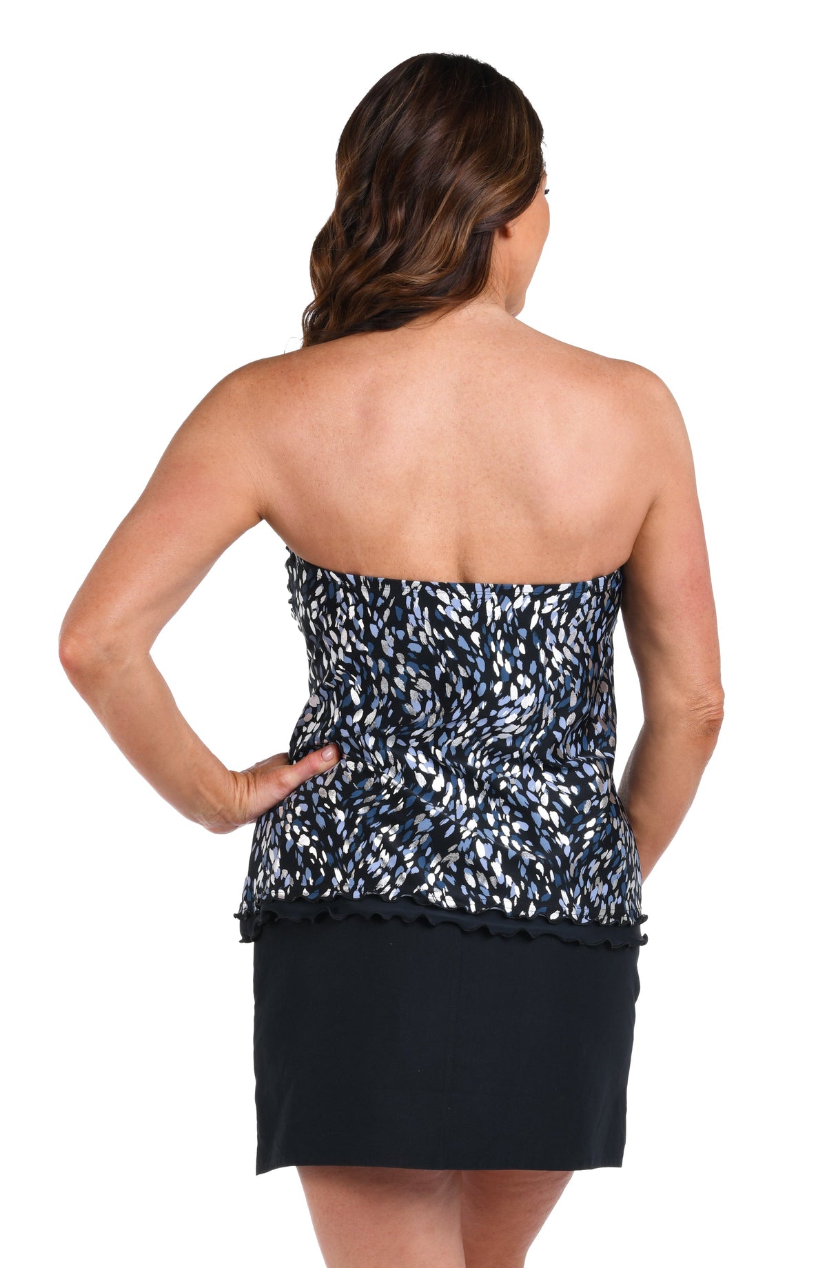 Back image of model wearing the strapless version of the Brushstroke Shimmer Ruffled Bandeau Tankini Top.