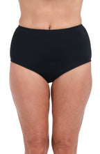 A close-up of a model wearing solid black high-waisted bikini bottoms against a plain white background.