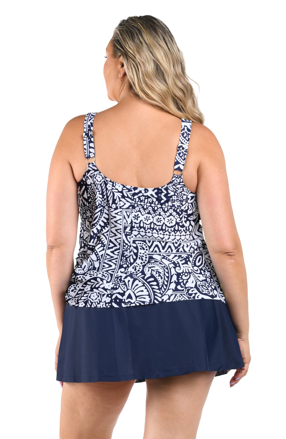 Woman wearing a faux skirtini one piece swimsuit