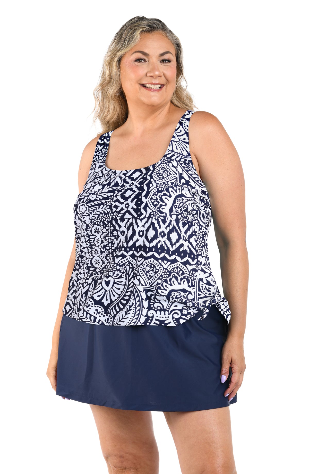 Woman wearing a faux skirtini one piece swimsuit