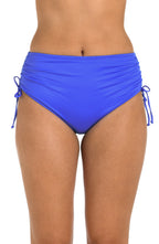 Blue bikini bottom with drawstring on a white background