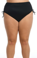 Model is wearing a solid black colored adjustable side tie hipster bikini bottom.