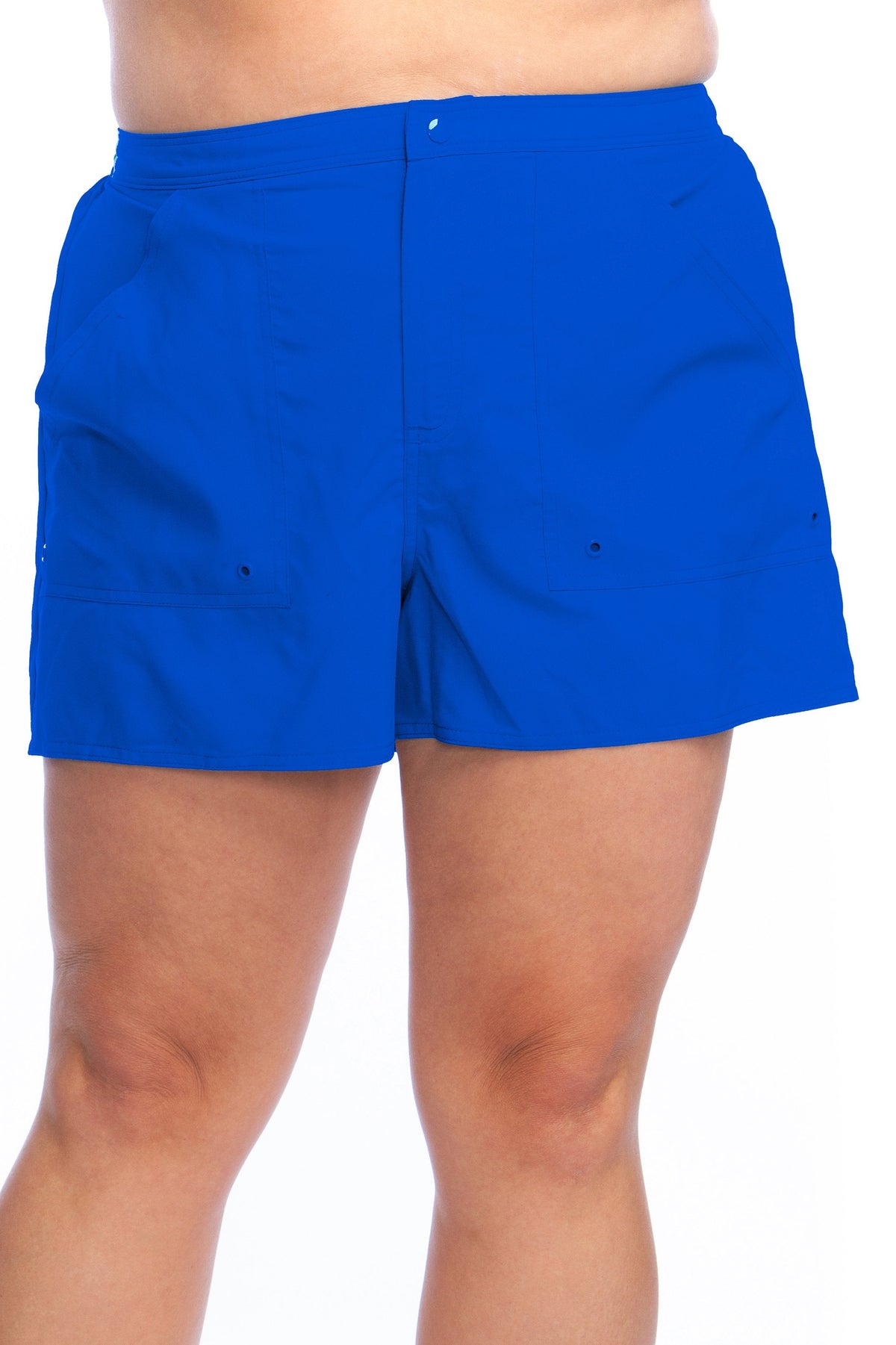 Model is wearing a solid cobalt blue colored woven board short bottom.