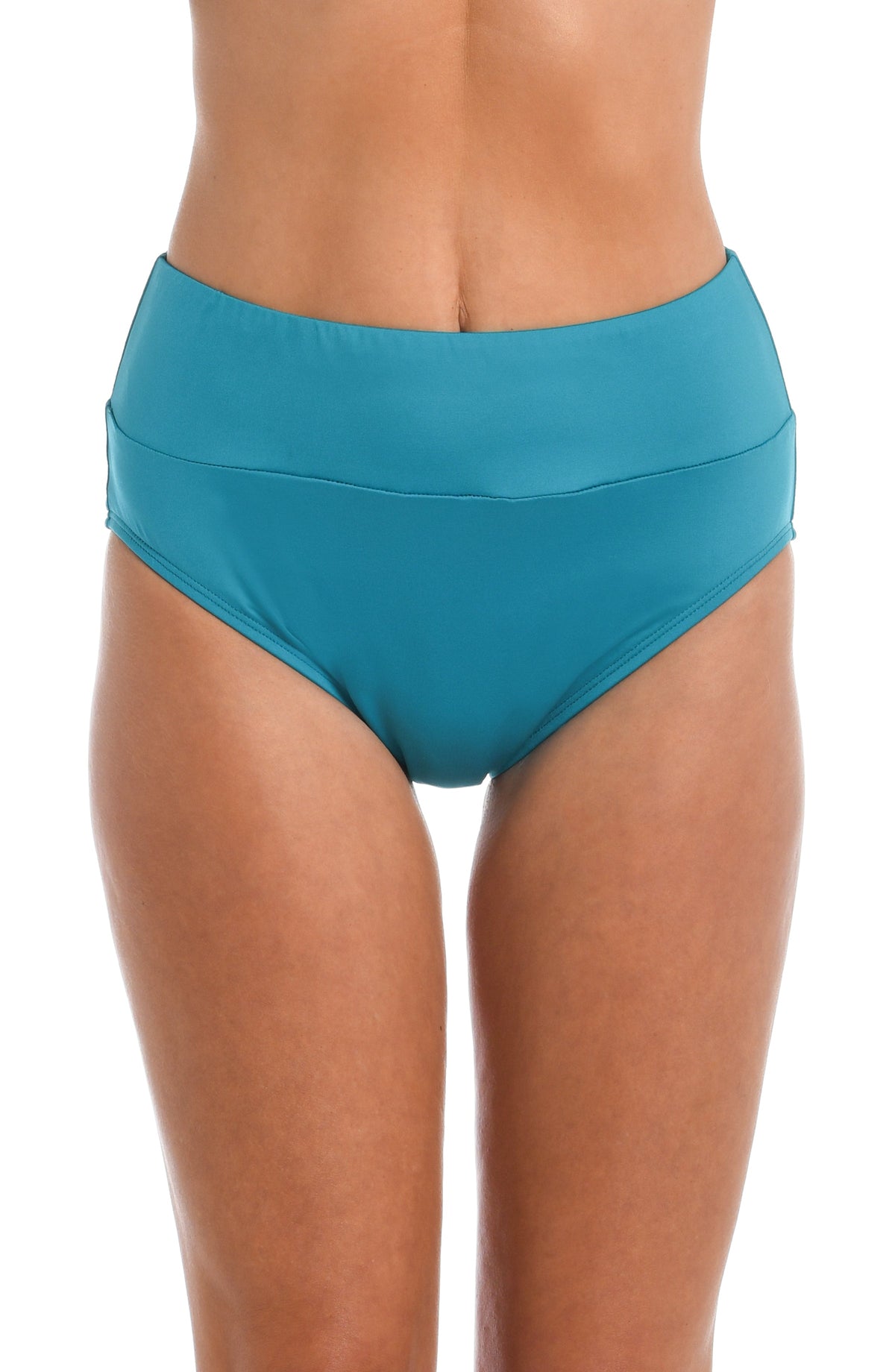 Model is wearing a solid midnight blue mid waist spliced hipster bikini bottom from our 24th & Ocean brand.