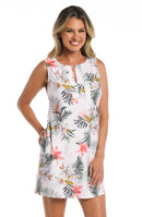Model is wearing a white multicolored tropical printed sleeveless shift dress cover up from our 24th & Ocean brand.